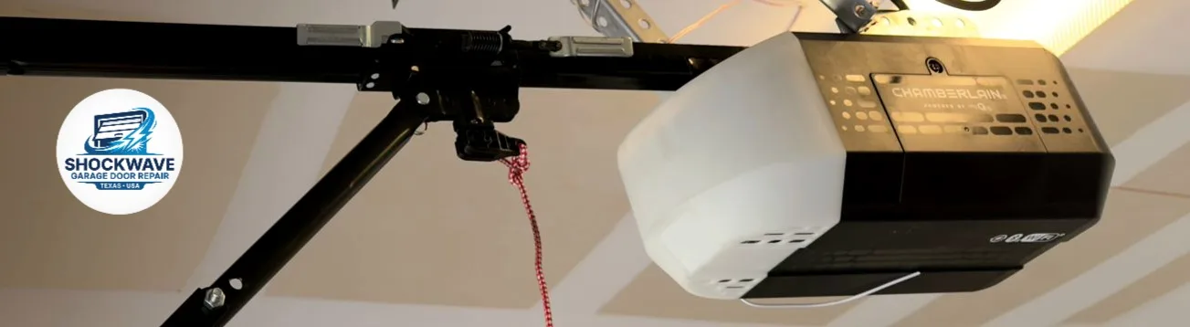 Chamberlain ceiling-mounted garage door opener and rail in Shockwave's Austin-area work gallery.